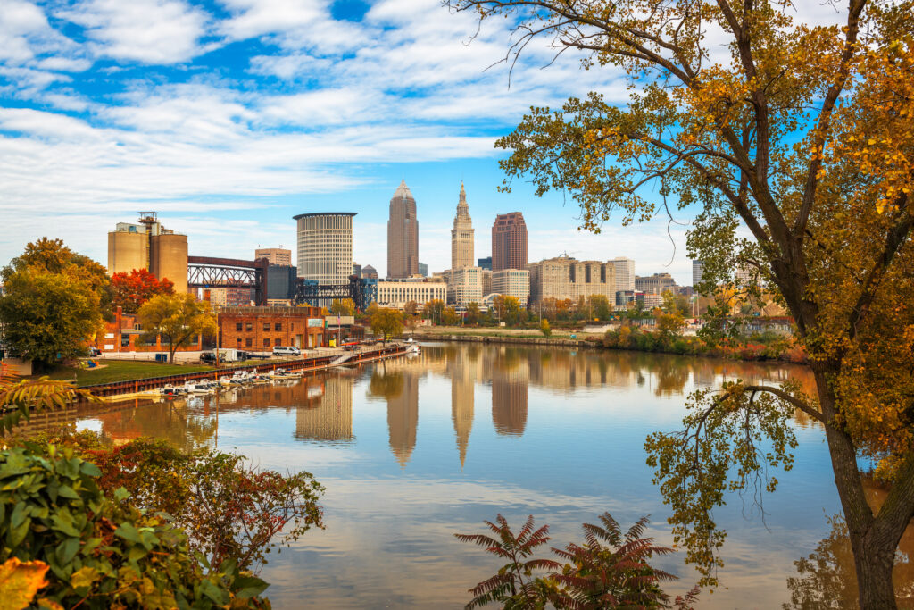 Cleveland, Ohio, USA skyline on the Cuyahoga River in autumn.