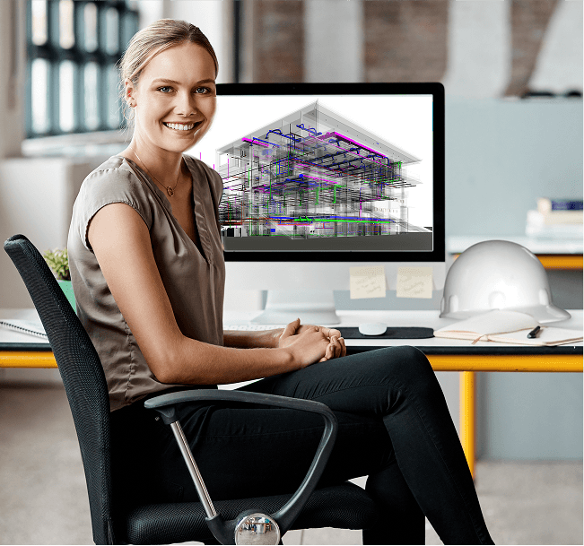 Engineer reviewing 3D construction building model at workstation